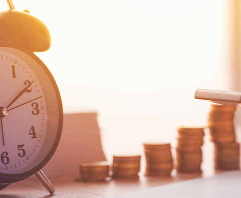 Savings-Account-Image of clock and stacked coins