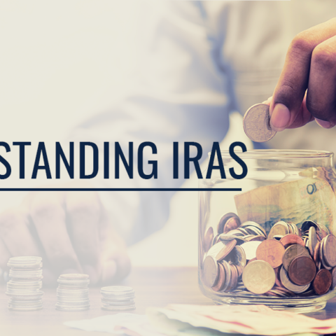 understanding IRAs with man putting change in a jar